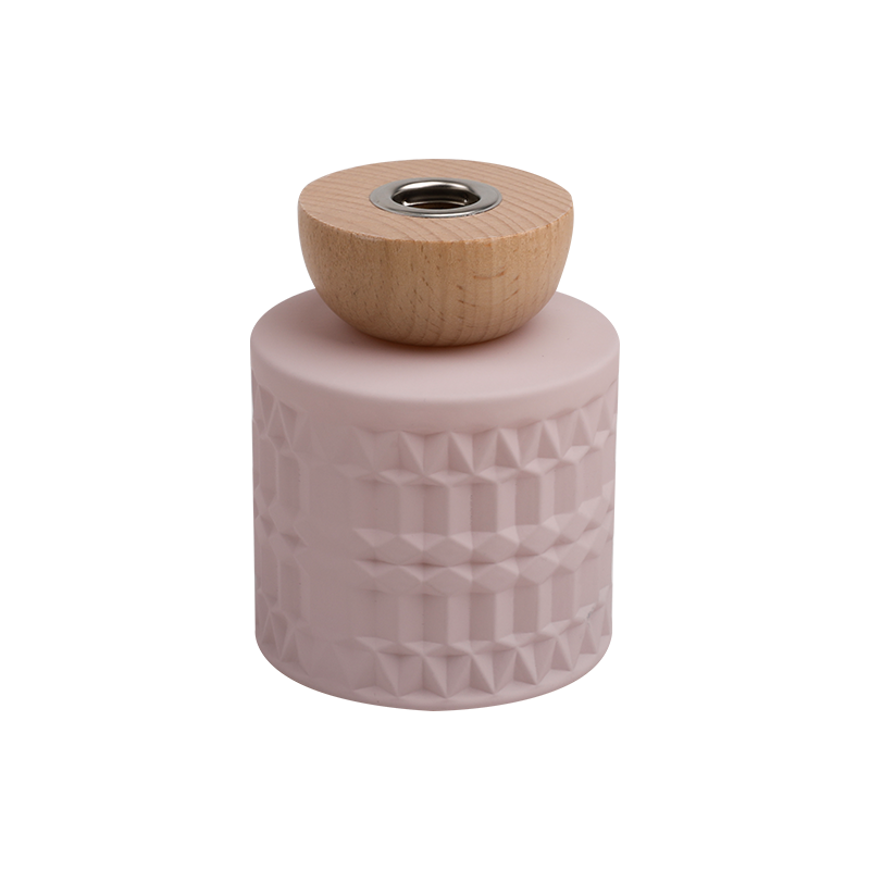 Borcan cu parfum roz cu model geometric cu capac din lemn
